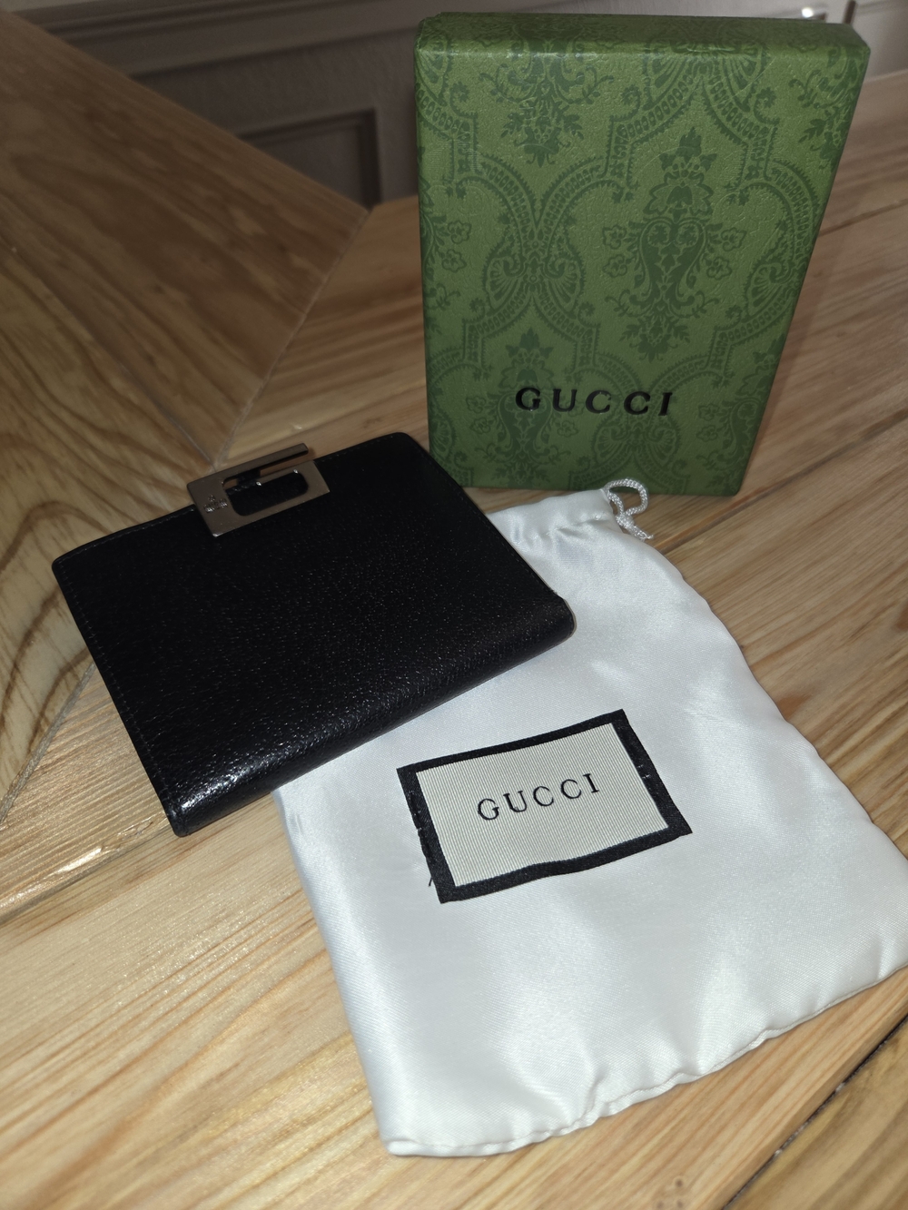 Gucci Black Leather Compact Wallet with Silver Hardware